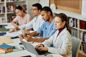 Arimgsas medical graduates can be seen studying together, helping each other out for their Exams